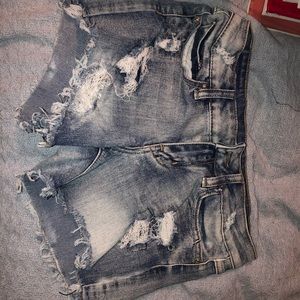 Distressed cut off jean shorts